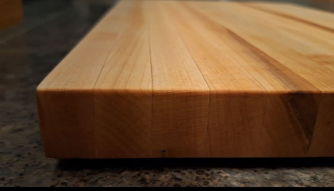 Close-up of a thick maple board edge showing the grain